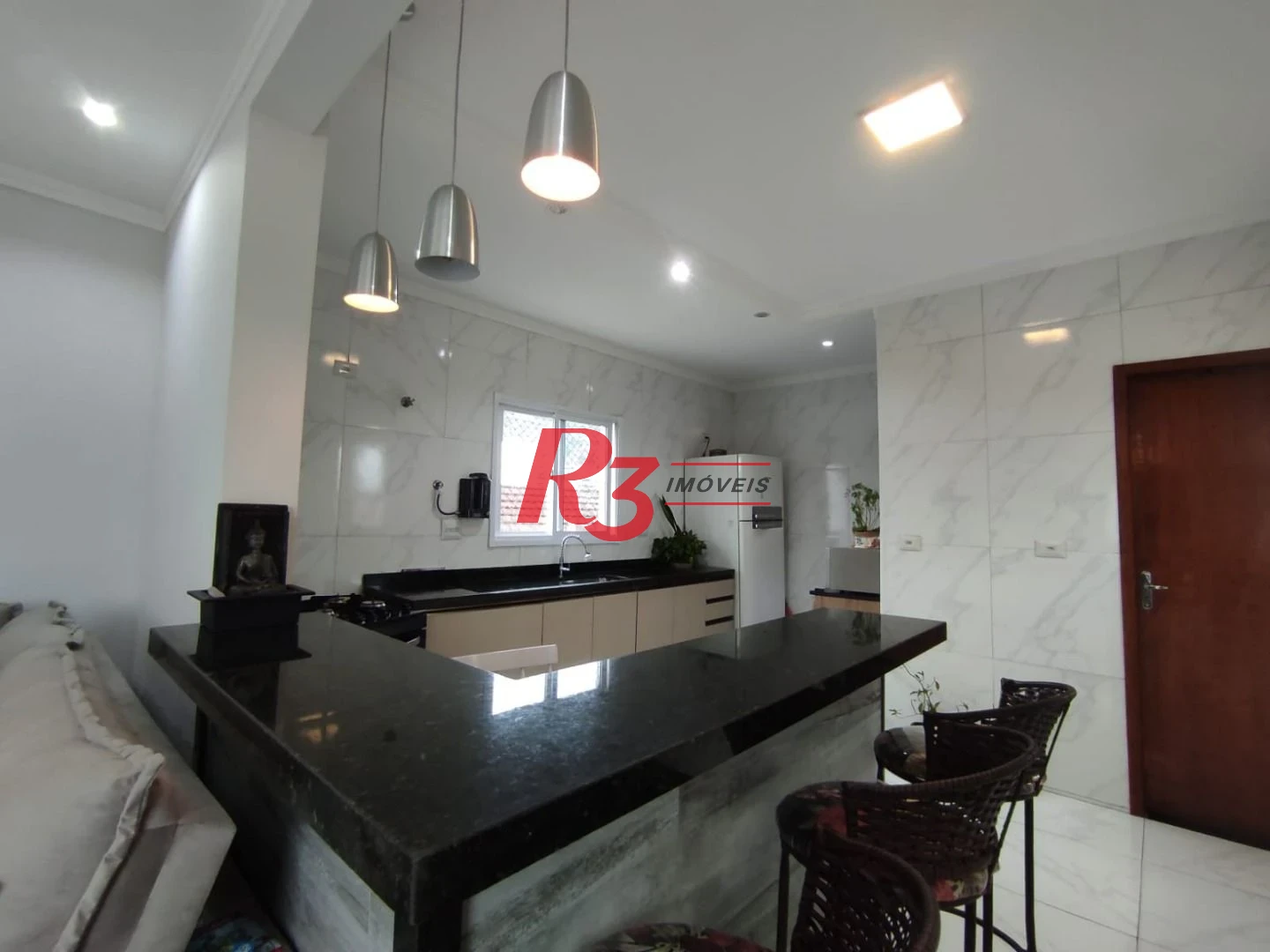 Casa à venda, 145 m² por R$ 560.000,00 - Vila Voturuá - São Vicente/SP