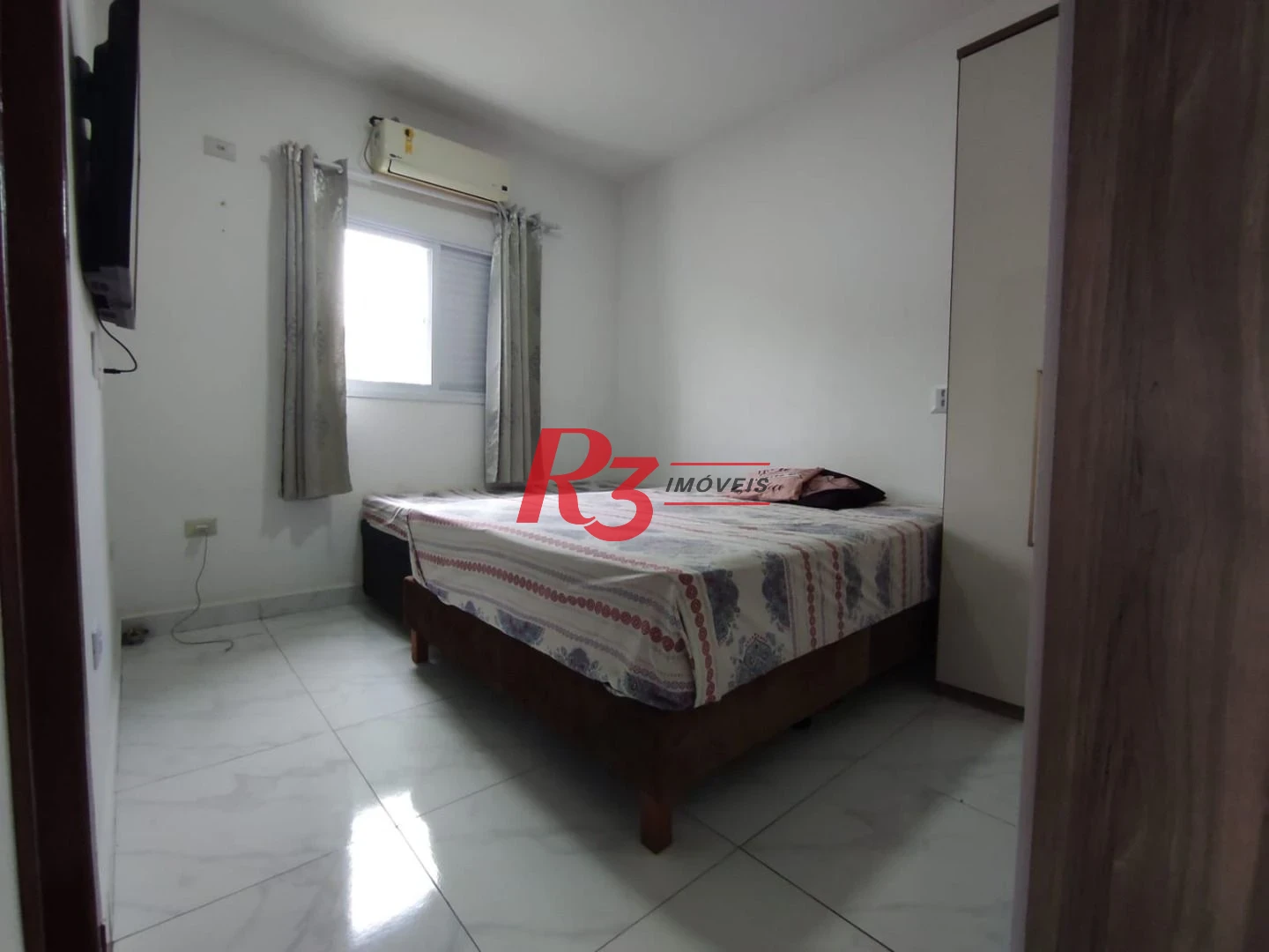 Casa à venda, 145 m² por R$ 560.000,00 - Vila Voturuá - São Vicente/SP