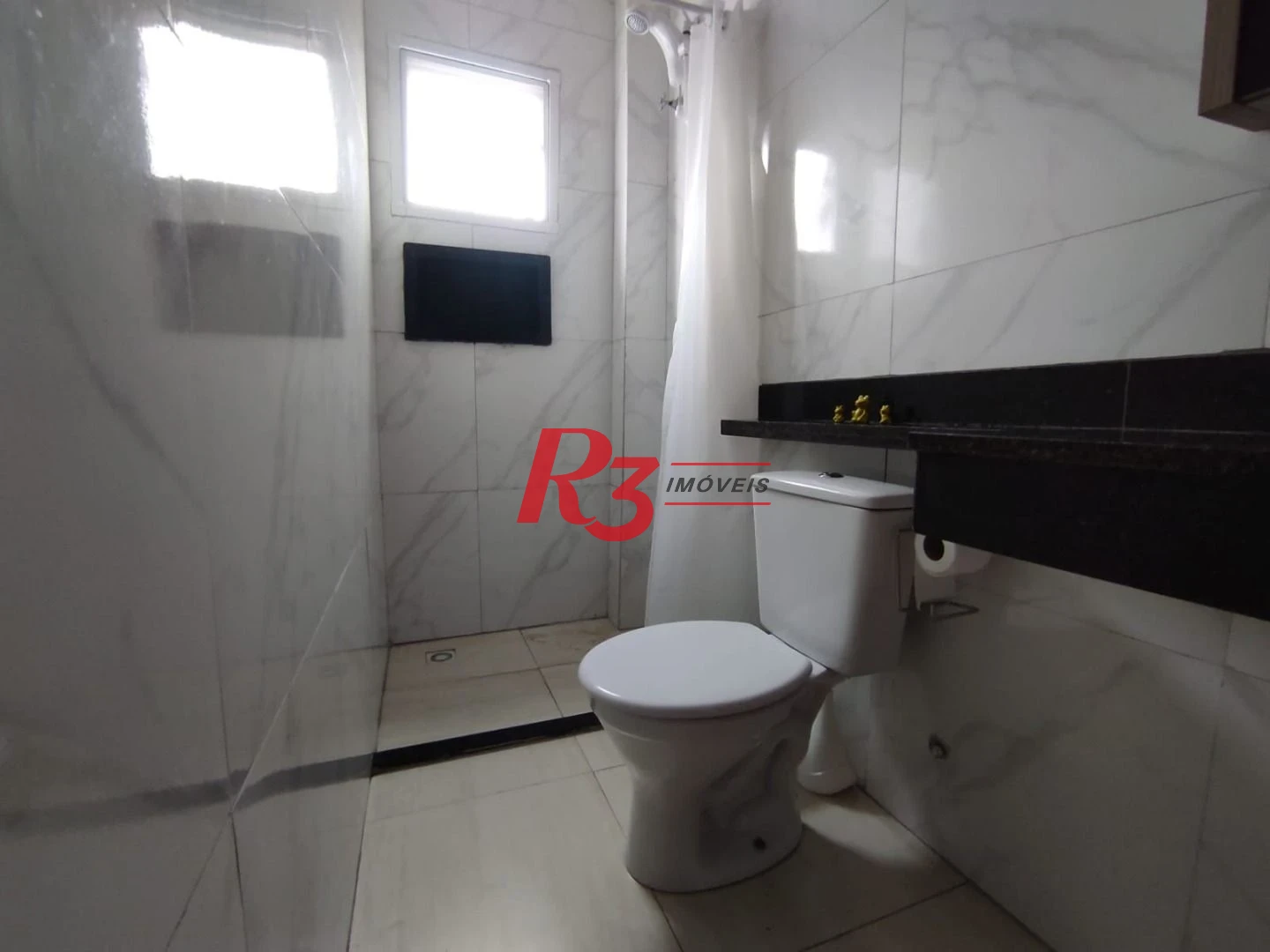 Casa à venda, 145 m² por R$ 560.000,00 - Vila Voturuá - São Vicente/SP