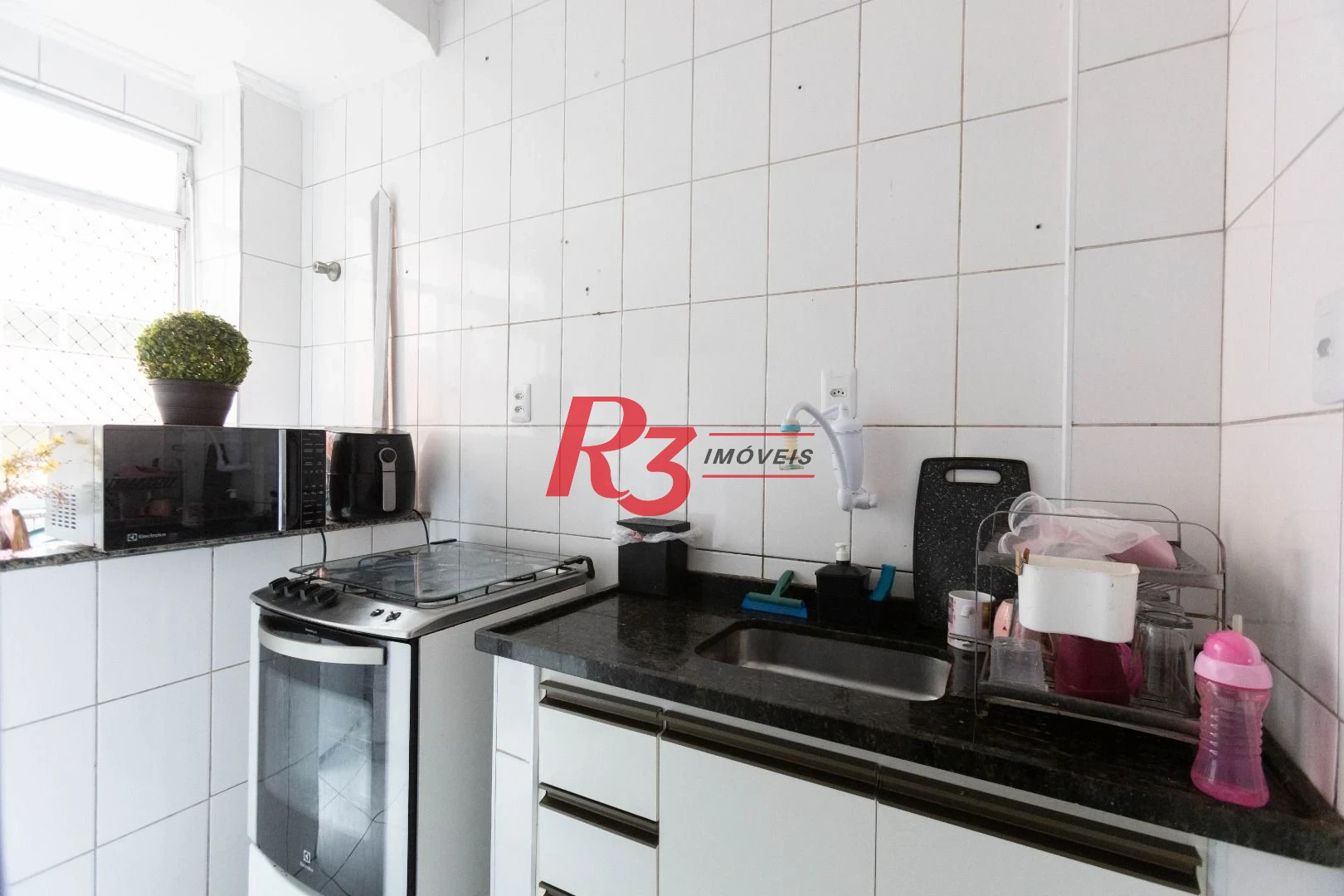 Apartamento com 2 dormitórios à venda, 57 m² por R$ 320.000,00 - José Menino - Santos/SP