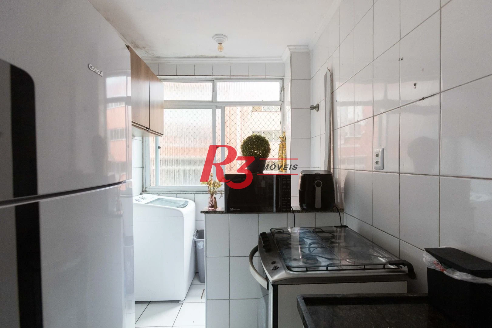 Apartamento com 2 dormitórios à venda, 57 m² por R$ 320.000,00 - José Menino - Santos/SP