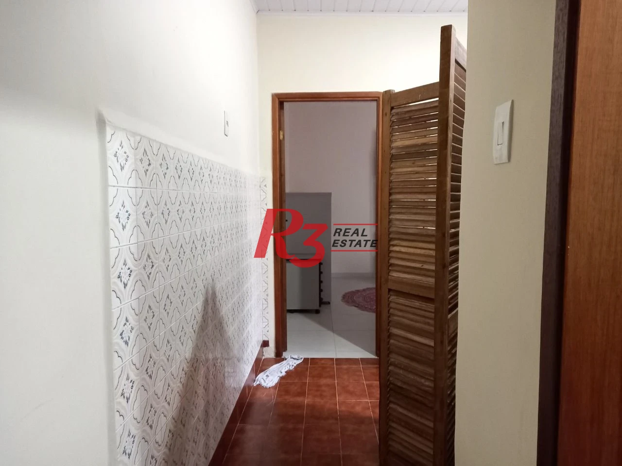 Casa com 3 dormitórios à venda, 98 m² por R$ 700.000,00 - Centro - São Vicente/SP