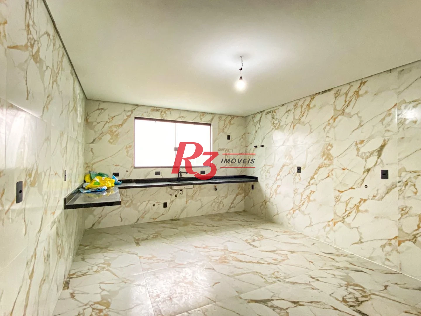 Sobrado com 3 dormitórios à venda, 300 m² por R$ 2.190.000,00 - Embaré - Santos/SP