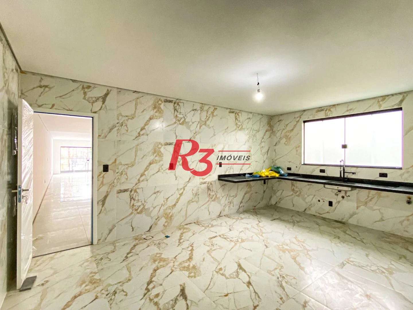 Sobrado com 3 dormitórios à venda, 300 m² por R$ 2.190.000,00 - Embaré - Santos/SP