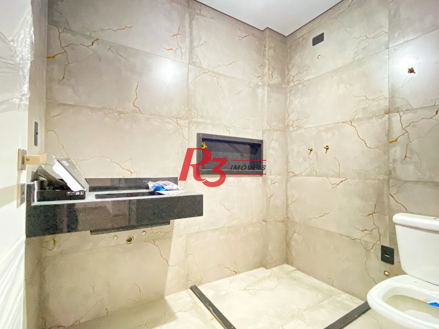 Sobrado com 3 dormitórios à venda, 300 m² por R$ 2.190.000,00 - Embaré - Santos/SP