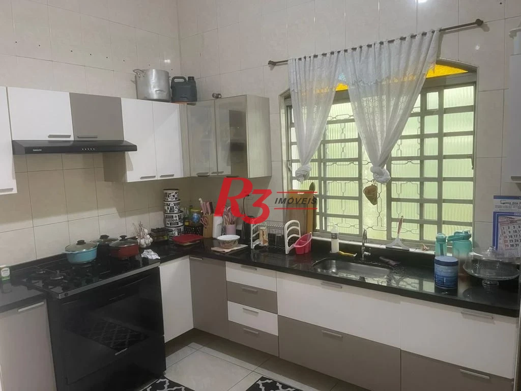 Casa com 4 dormitórios à venda, 340 m² por R$ 1.280.000,00 - Jardim Guassu - São Vicente/SP