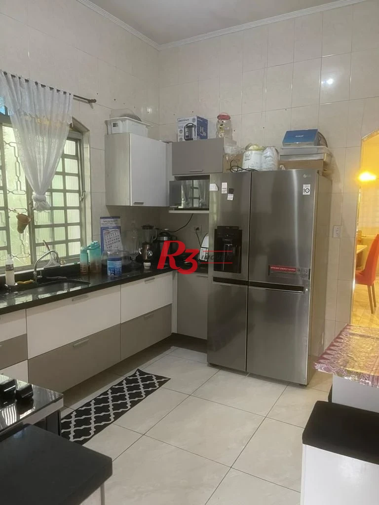 Casa com 4 dormitórios à venda, 340 m² por R$ 1.280.000,00 - Jardim Guassu - São Vicente/SP