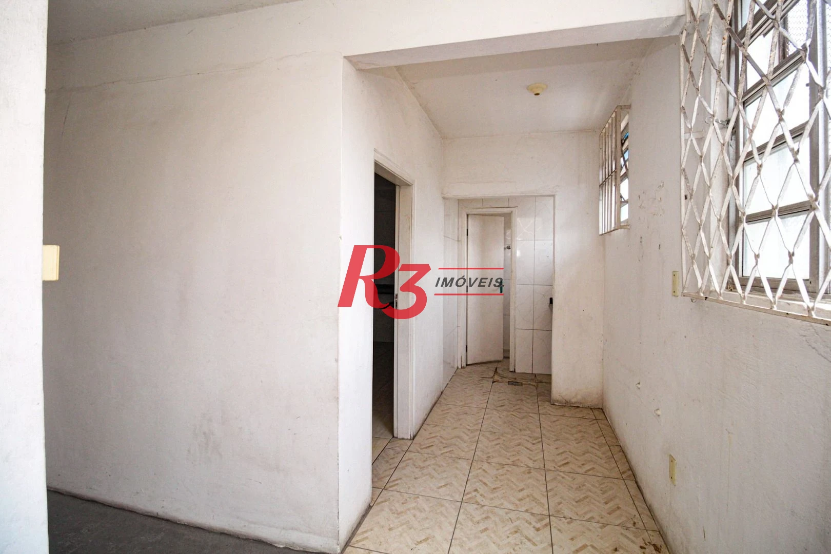 Prédio, 555 m² - venda por R$ 1.750.000,00 ou aluguel por R$ 10.000,00/mês - Valongo - Santos/SP
