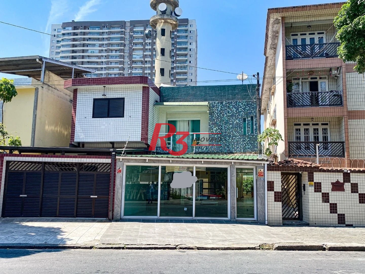 Sobrado com 3 dormitórios à venda, 220 m² por R$ 1.200.000,00 - Encruzilhada - Santos/SP