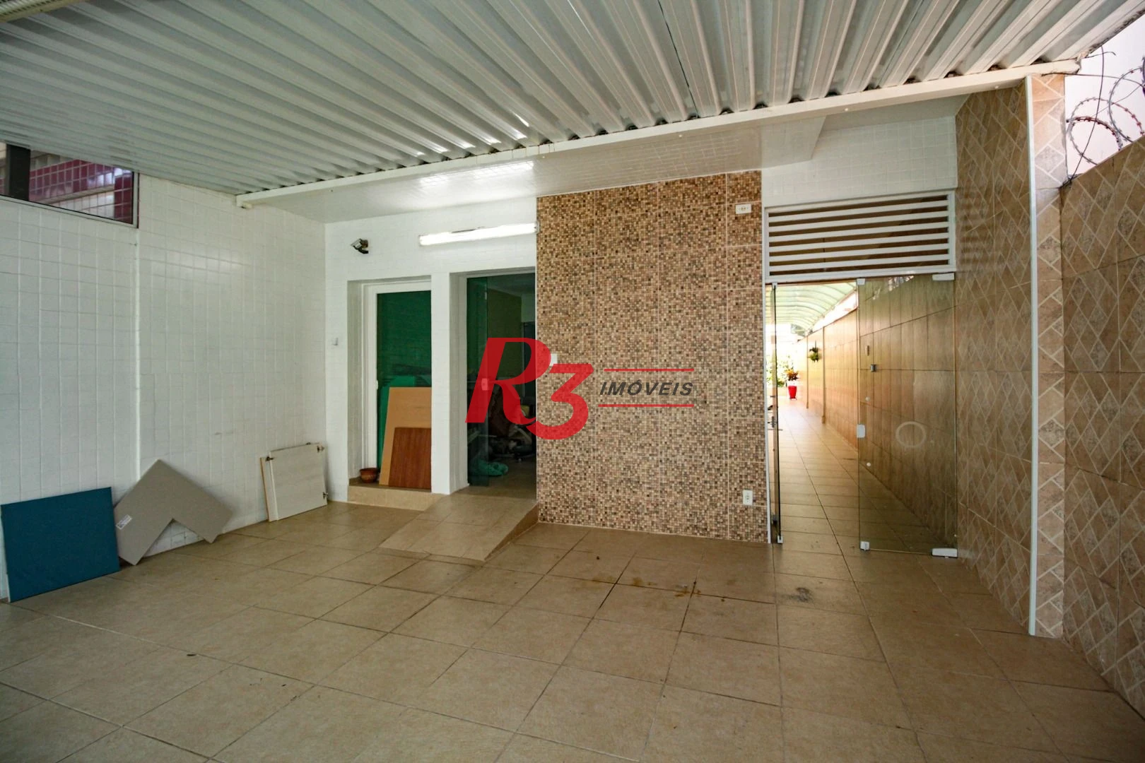 Sobrado com 3 dormitórios à venda, 220 m² por R$ 1.200.000,00 - Encruzilhada - Santos/SP