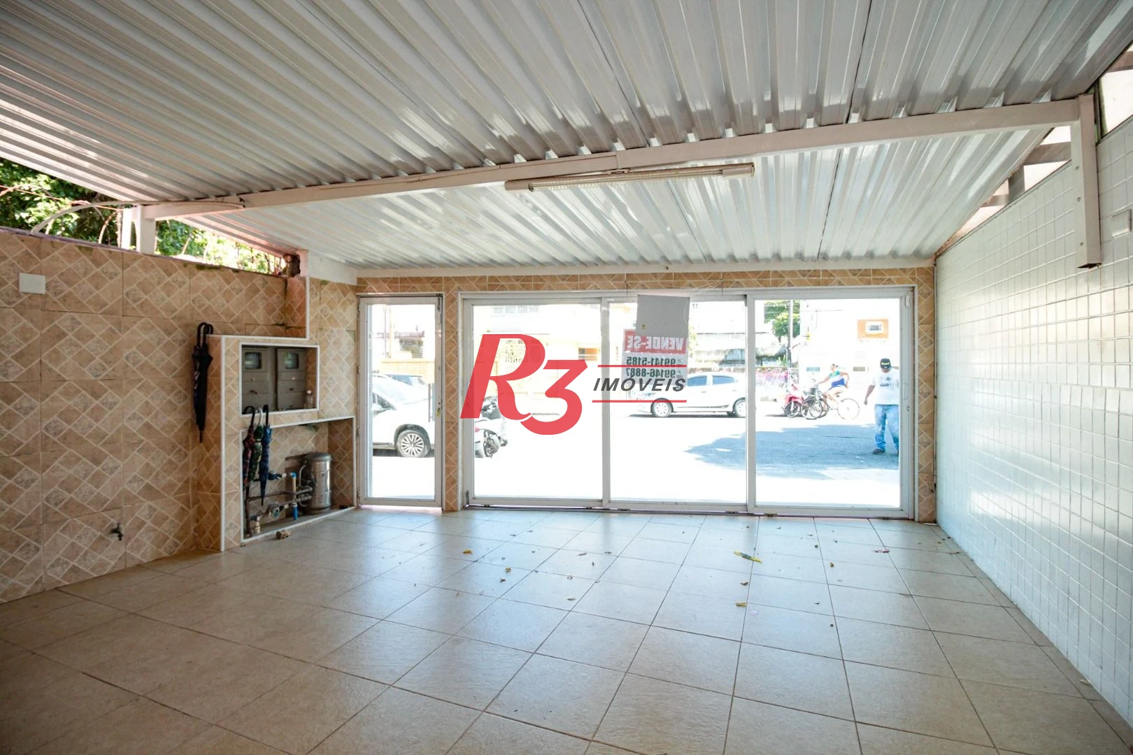 Sobrado com 3 dormitórios à venda, 220 m² por R$ 1.200.000,00 - Encruzilhada - Santos/SP