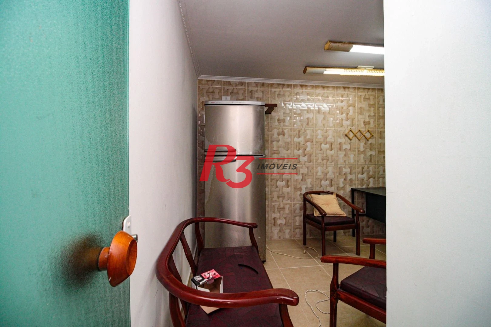 Sobrado com 3 dormitórios à venda, 220 m² por R$ 1.200.000,00 - Encruzilhada - Santos/SP