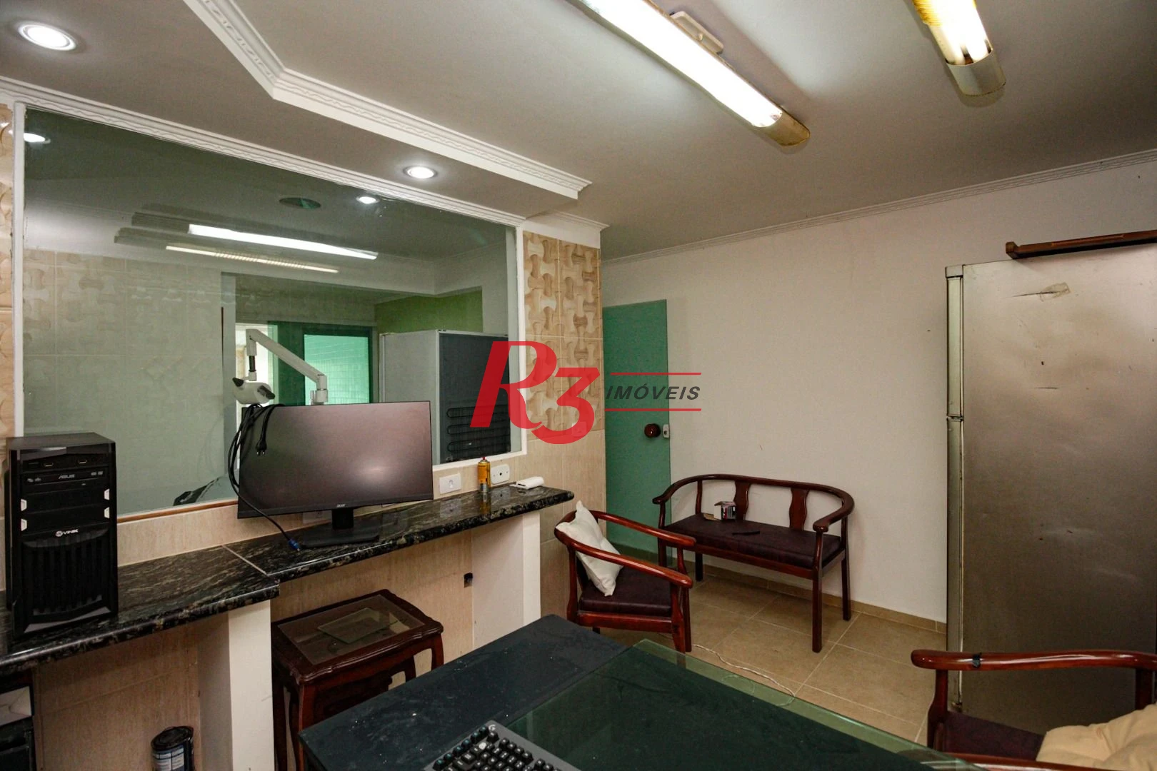 Sobrado com 3 dormitórios à venda, 220 m² por R$ 1.200.000,00 - Encruzilhada - Santos/SP