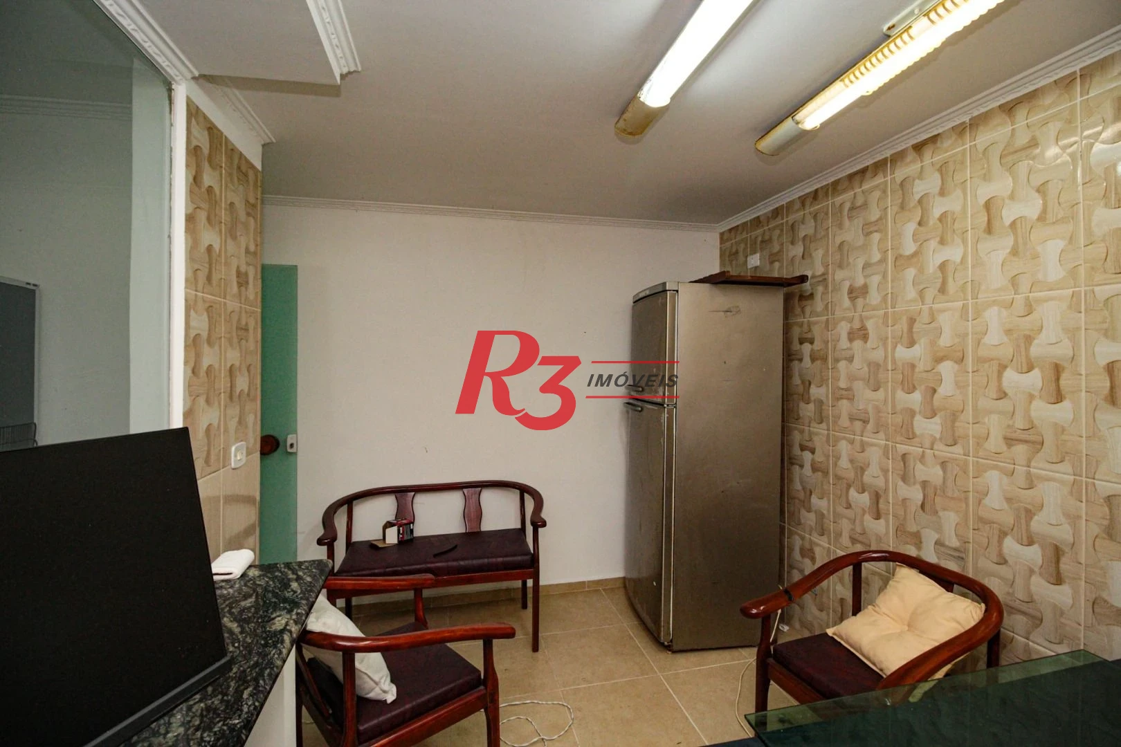 Sobrado com 3 dormitórios à venda, 220 m² por R$ 1.200.000,00 - Encruzilhada - Santos/SP