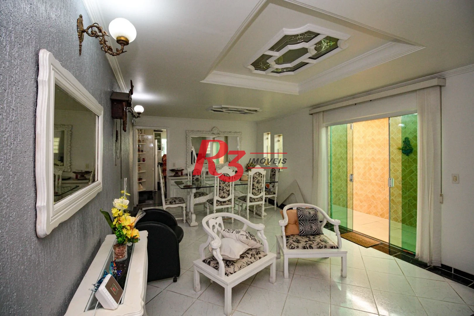 Sobrado com 3 dormitórios à venda, 220 m² por R$ 1.200.000,00 - Encruzilhada - Santos/SP