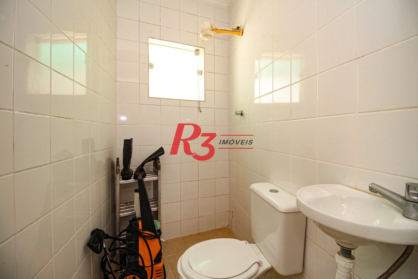 Sobrado com 3 dormitórios à venda, 220 m² por R$ 1.200.000,00 - Encruzilhada - Santos/SP