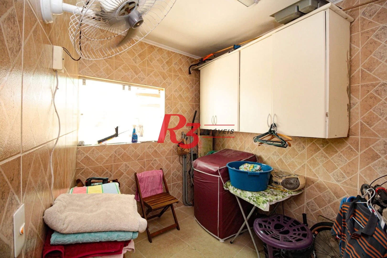 Sobrado com 3 dormitórios à venda, 220 m² por R$ 1.200.000,00 - Encruzilhada - Santos/SP