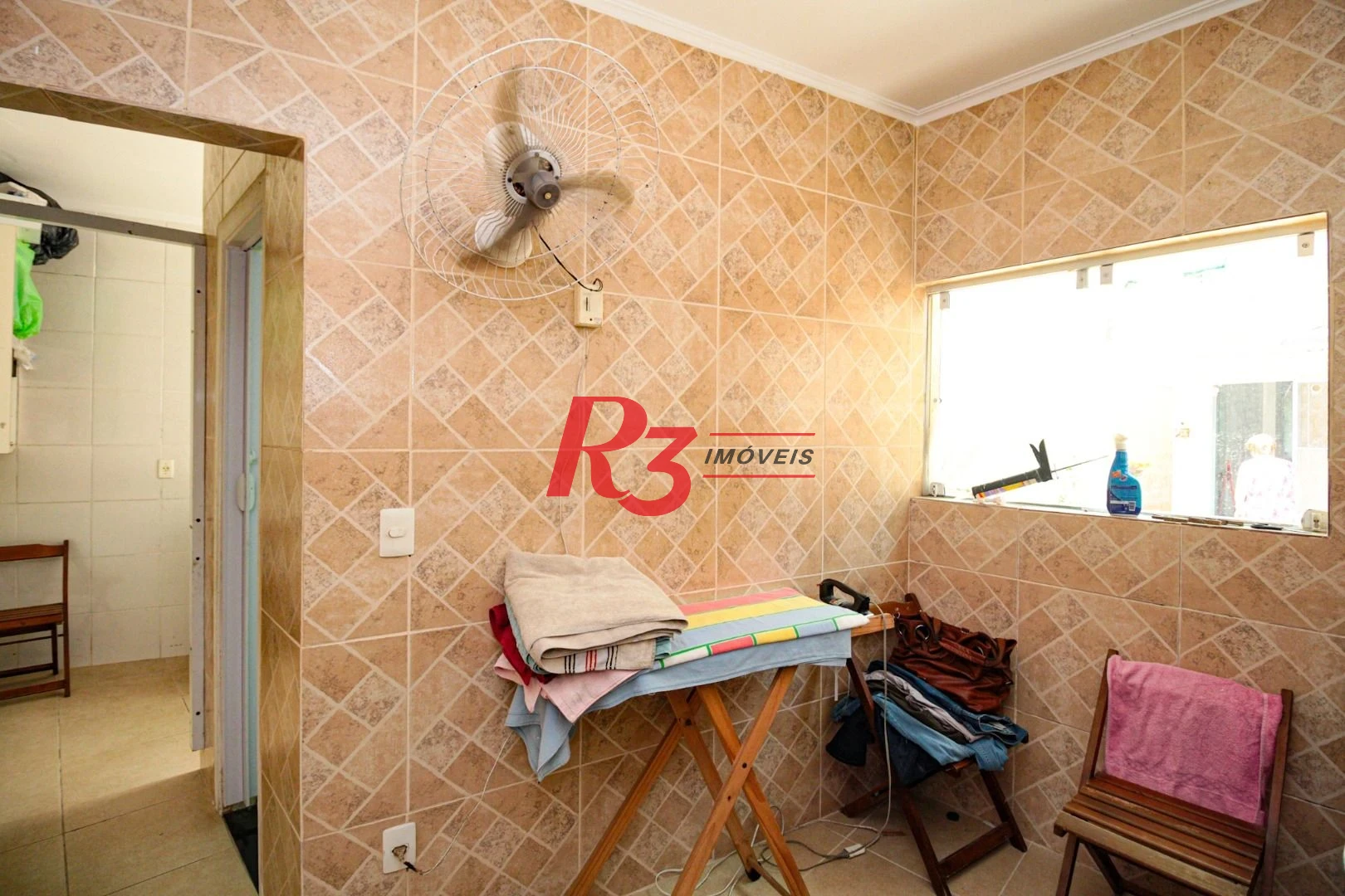 Sobrado com 3 dormitórios à venda, 220 m² por R$ 1.200.000,00 - Encruzilhada - Santos/SP