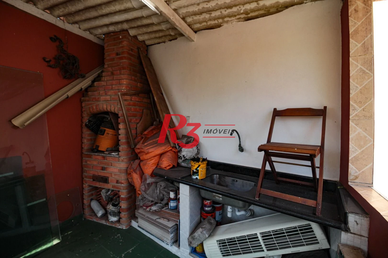 Sobrado com 3 dormitórios à venda, 220 m² por R$ 1.200.000,00 - Encruzilhada - Santos/SP