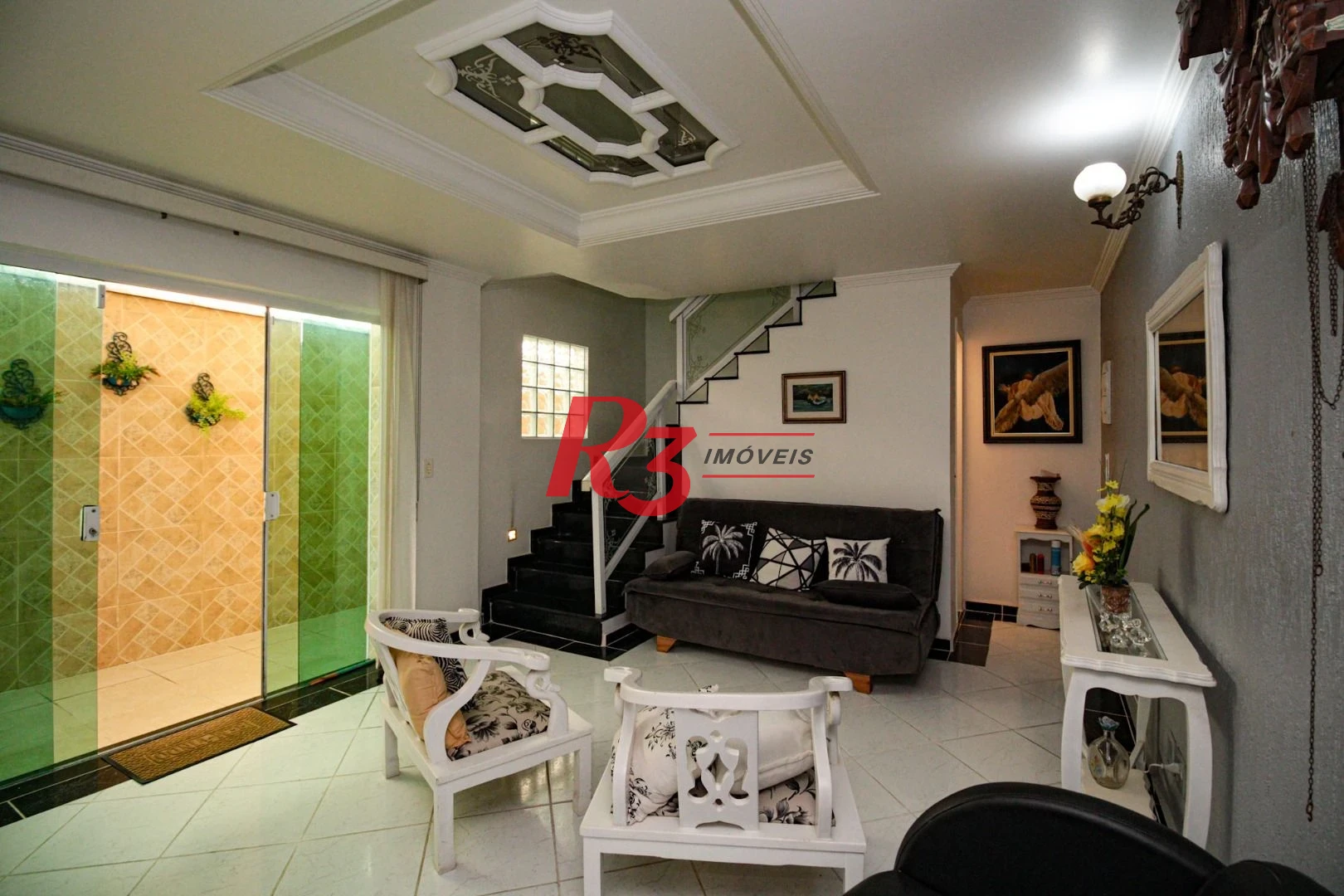 Sobrado com 3 dormitórios à venda, 220 m² por R$ 1.200.000,00 - Encruzilhada - Santos/SP