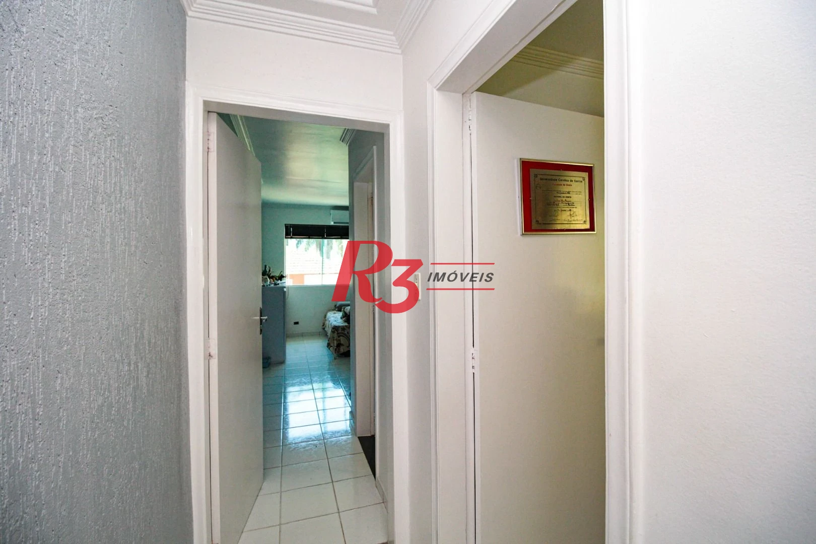 Sobrado com 3 dormitórios à venda, 220 m² por R$ 1.200.000,00 - Encruzilhada - Santos/SP