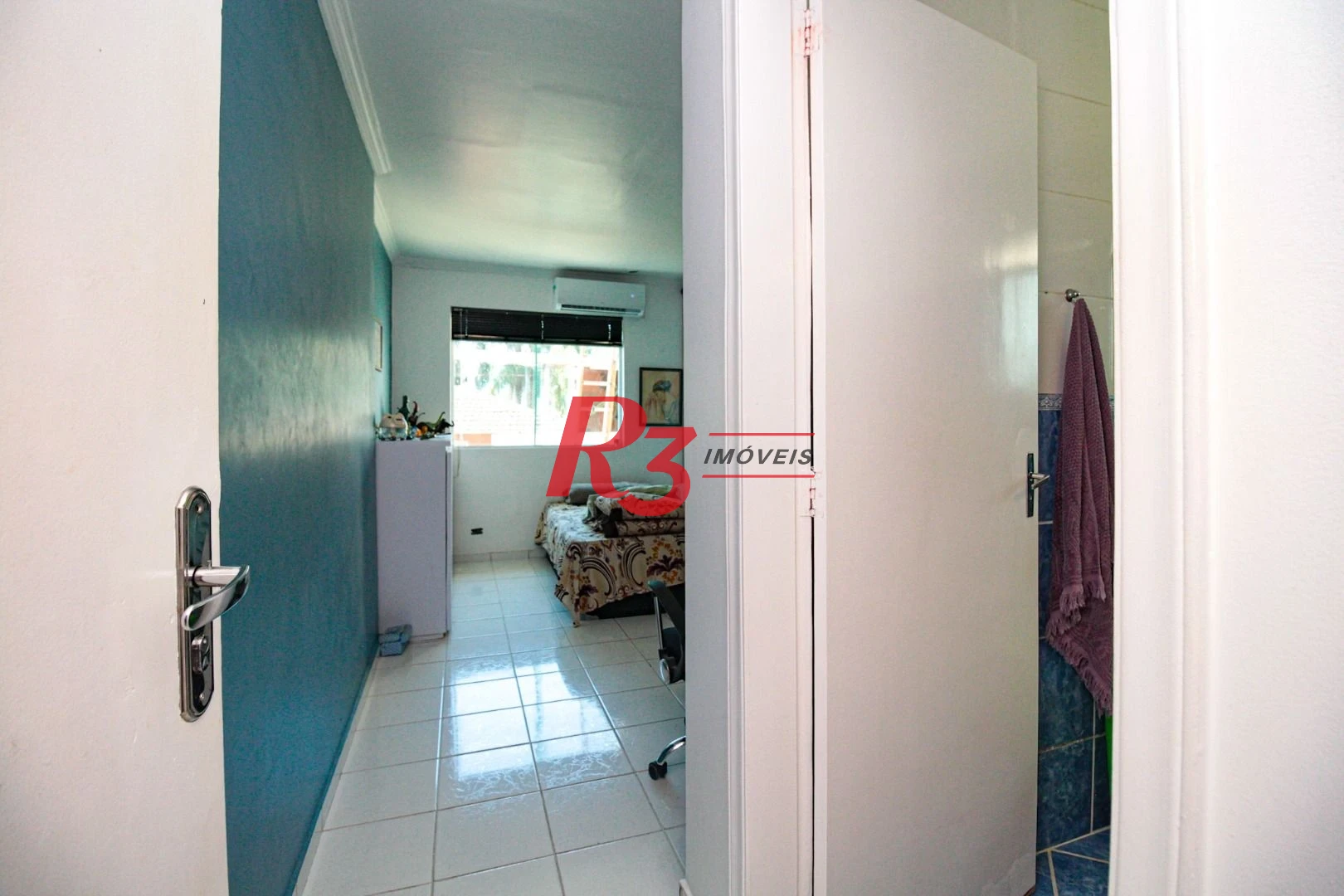 Sobrado com 3 dormitórios à venda, 220 m² por R$ 1.200.000,00 - Encruzilhada - Santos/SP