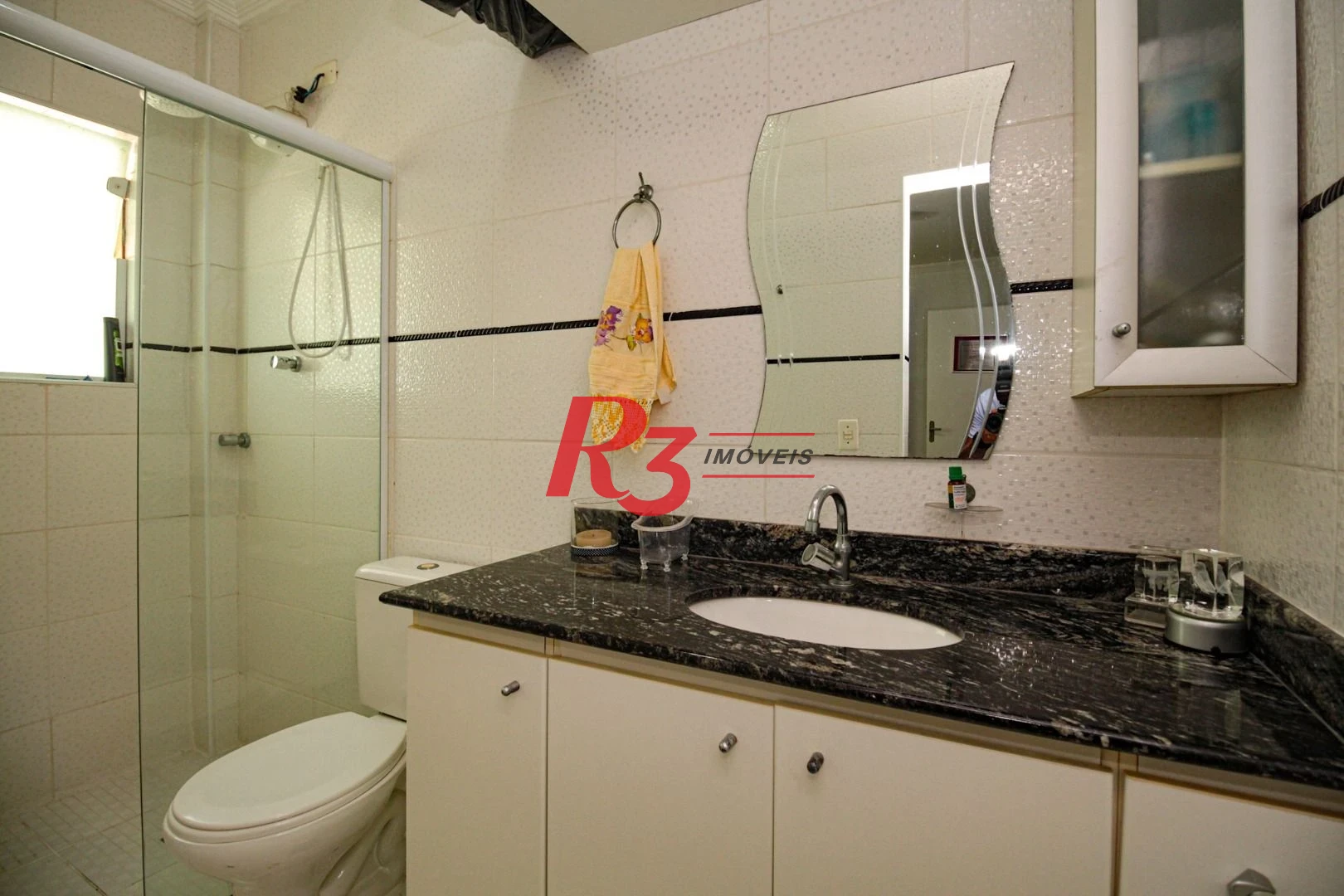 Sobrado com 3 dormitórios à venda, 220 m² por R$ 1.200.000,00 - Encruzilhada - Santos/SP