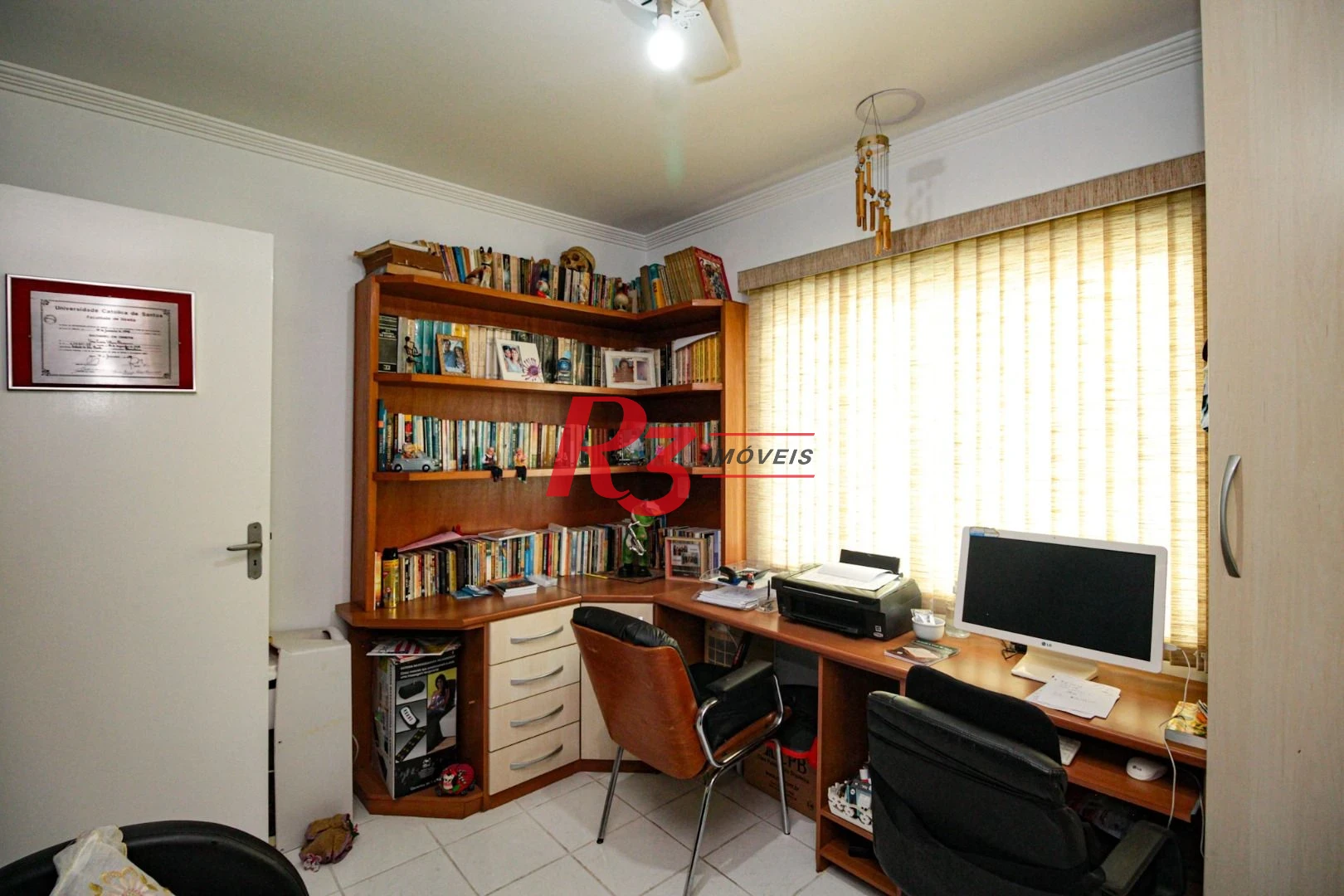 Sobrado com 3 dormitórios à venda, 220 m² por R$ 1.200.000,00 - Encruzilhada - Santos/SP