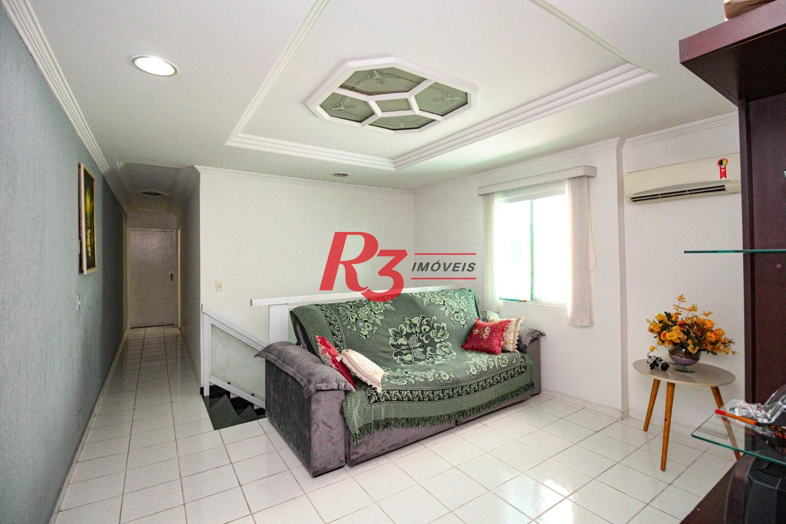 Sobrado com 3 dormitórios à venda, 220 m² por R$ 1.200.000,00 - Encruzilhada - Santos/SP