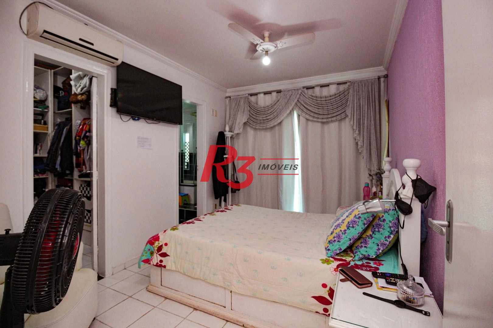Sobrado com 3 dormitórios à venda, 220 m² por R$ 1.200.000,00 - Encruzilhada - Santos/SP