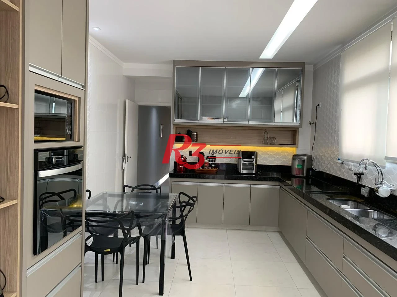 Casa com 3 dormitórios à venda, 200 m² por R$ 1.225.000,00 - Boqueirão - Santos/SP