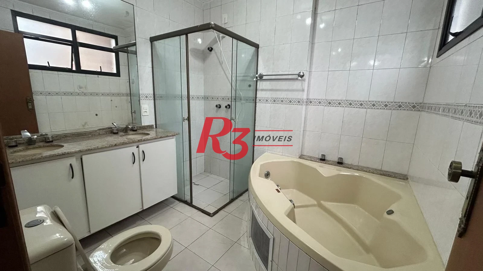 Apartamento com 3 dormitórios à venda, 189 m² por R$ 1.250.000,00 - Gonzaga - Santos/SP