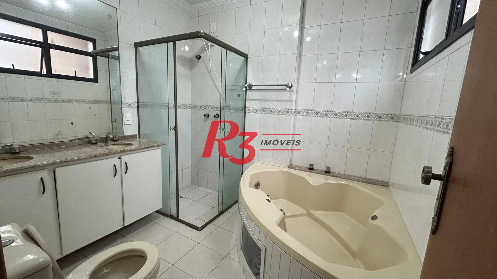 Apartamento com 3 dormitórios à venda, 189 m² por R$ 1.250.000,00 - Gonzaga - Santos/SP