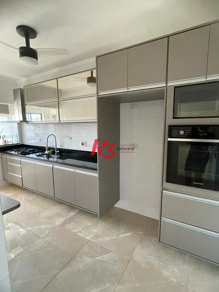 Aparecida - totalmente reformado - 2 dorm com 3 revertido - cozinha totalmente mobiliada - frente - ar condicionado.