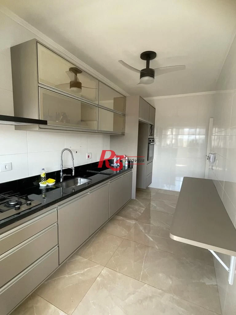 Aparecida - totalmente reformado - 2 dorm com 3 revertido - cozinha totalmente mobiliada - frente - ar condicionado.