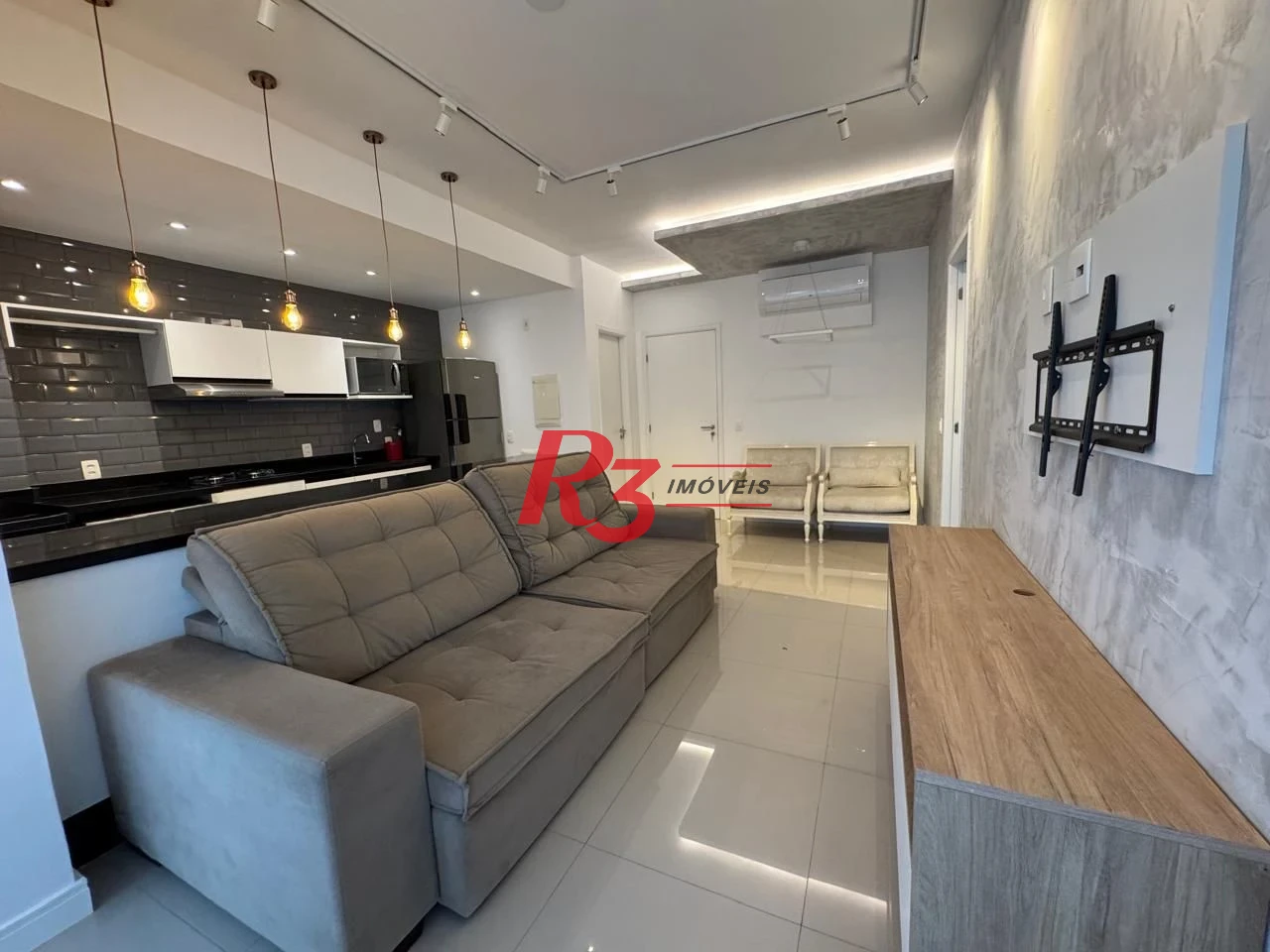 Apartamento com 1 dormitório para alugar, 57 m² por R$ 6.200,00/mês - Gonzaga - Santos/SP
