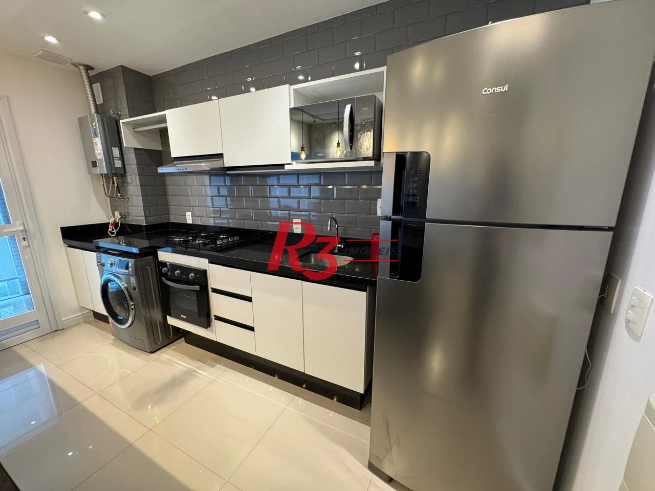 Apartamento com 1 dormitório para alugar, 57 m² por R$ 6.200,00/mês - Gonzaga - Santos/SP