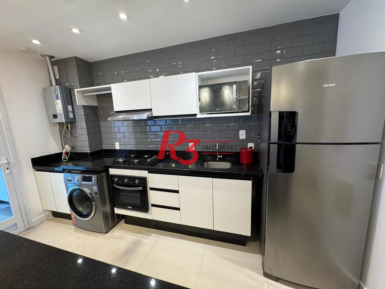 Apartamento com 1 dormitório para alugar, 57 m² por R$ 6.200,00/mês - Gonzaga - Santos/SP