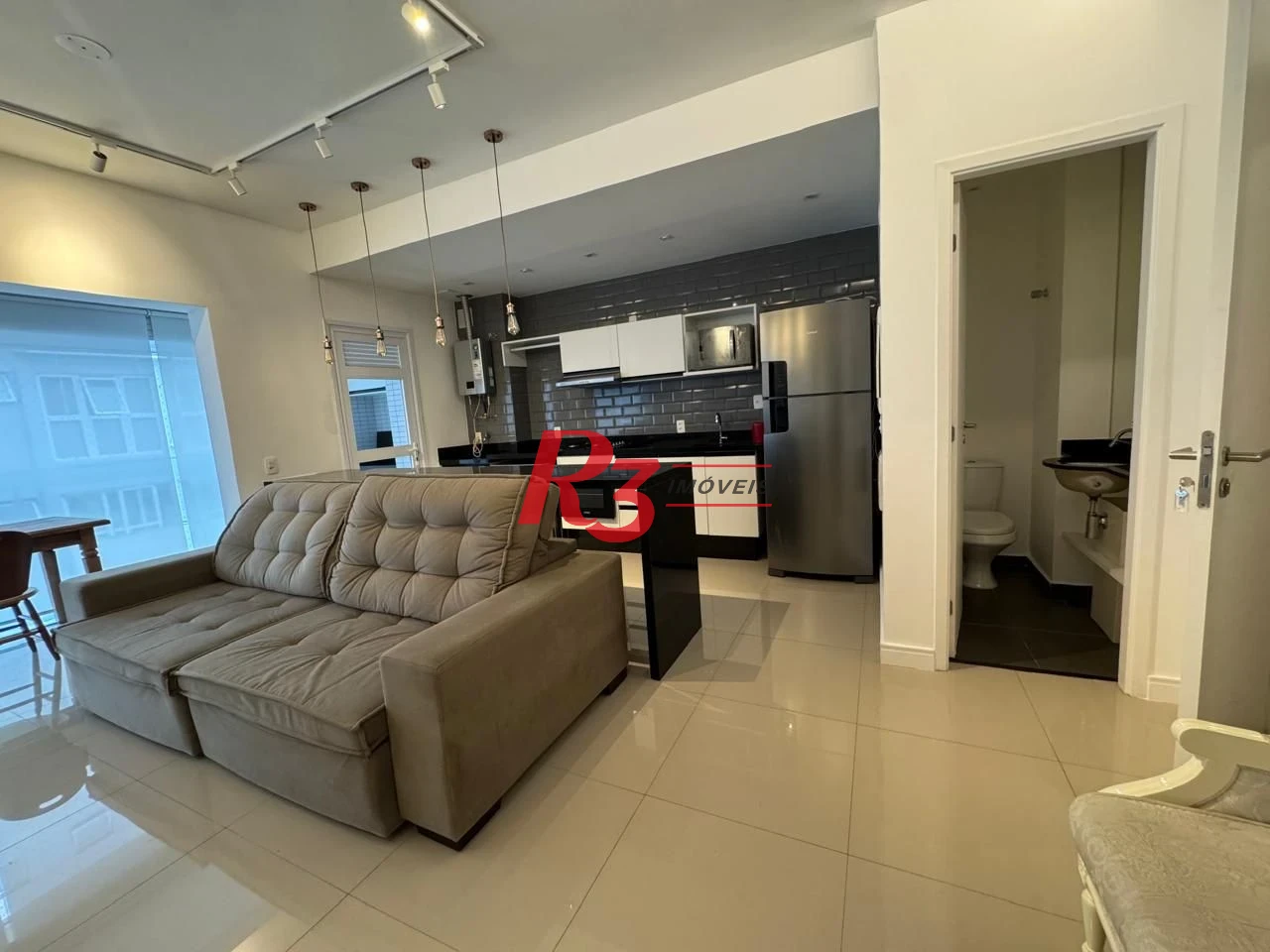 Apartamento com 1 dormitório para alugar, 57 m² por R$ 6.200,00/mês - Gonzaga - Santos/SP