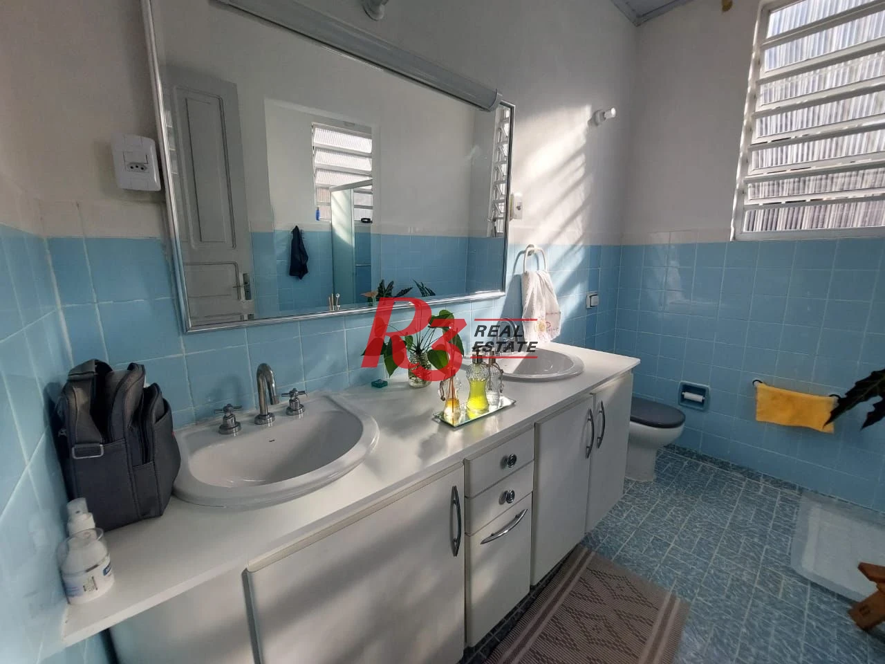 Sobrado com 3 dormitórios à venda, 200 m² por R$ 1.390.000,00 - Embaré - Santos/SP