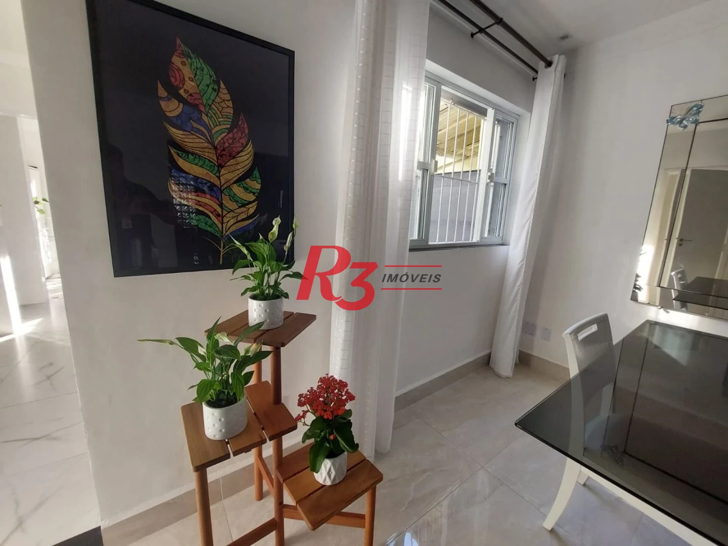 Sobrado com 3 dormitórios à venda, 200 m² por R$ 2.150.000,00 - Embaré - Santos/SP