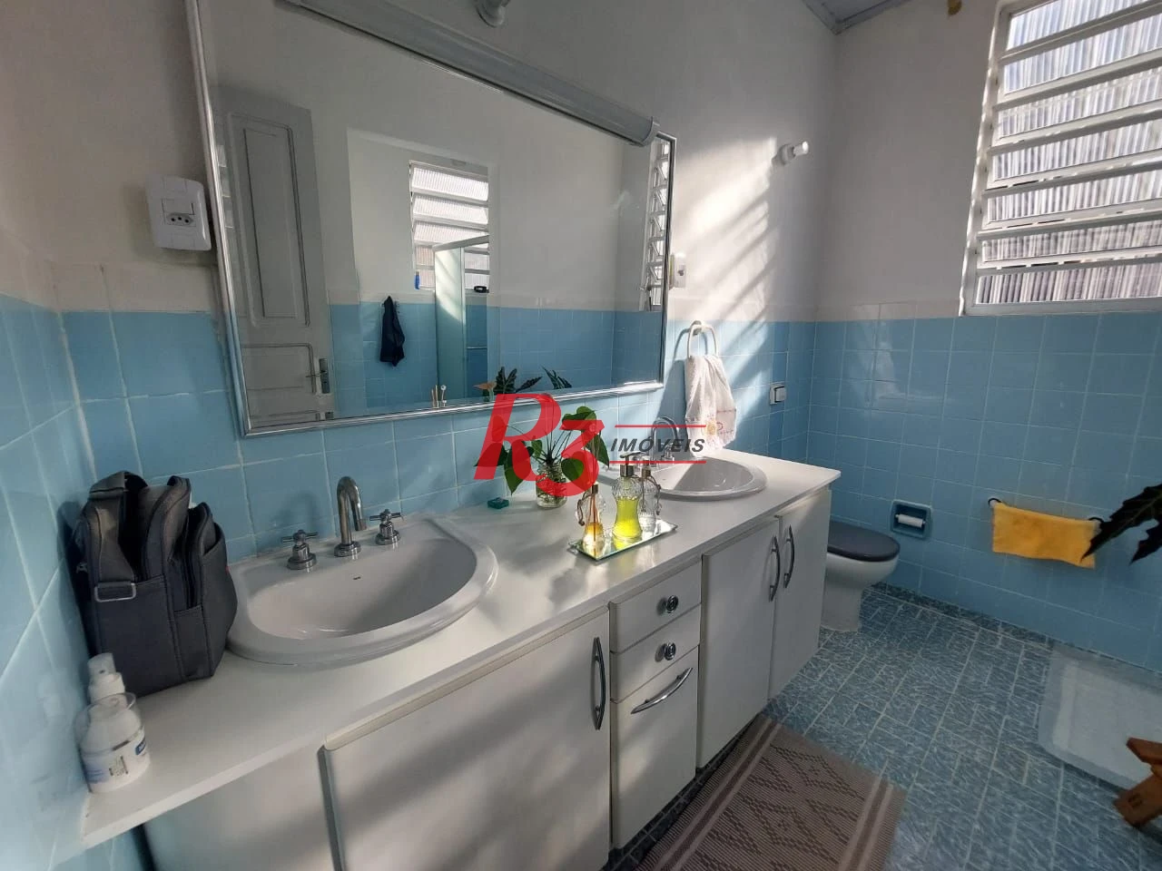 Sobrado com 3 dormitórios à venda, 200 m² por R$ 2.150.000,00 - Embaré - Santos/SP