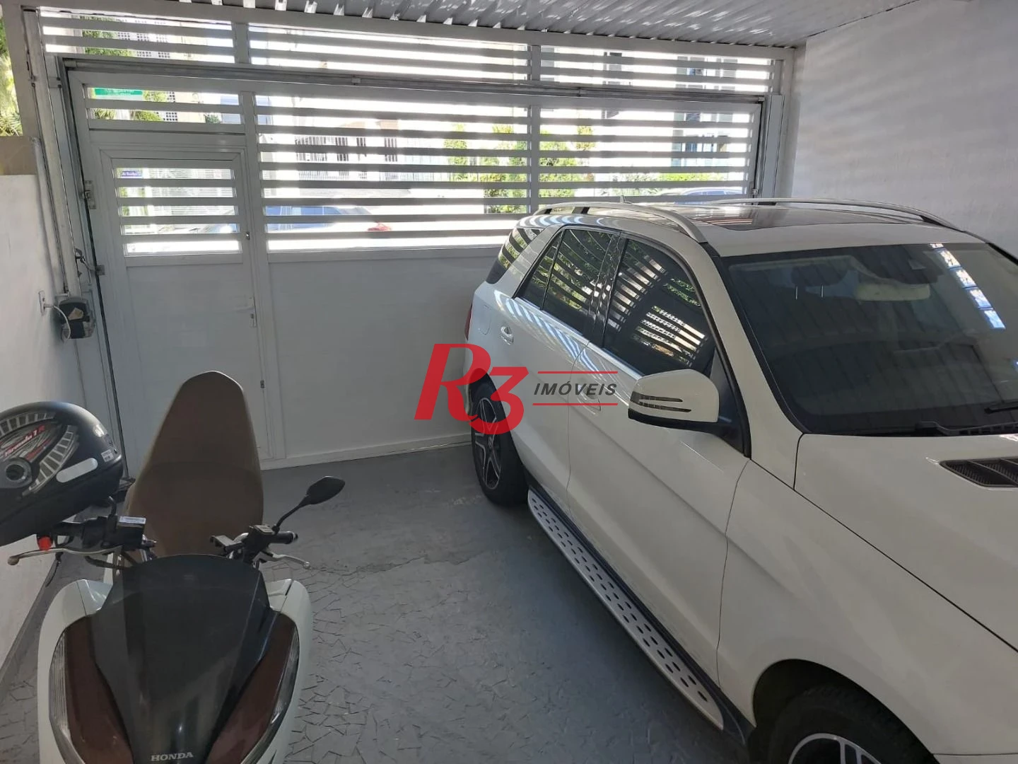 Sobrado com 3 dormitórios à venda, 200 m² por R$ 2.150.000,00 - Embaré - Santos/SP
