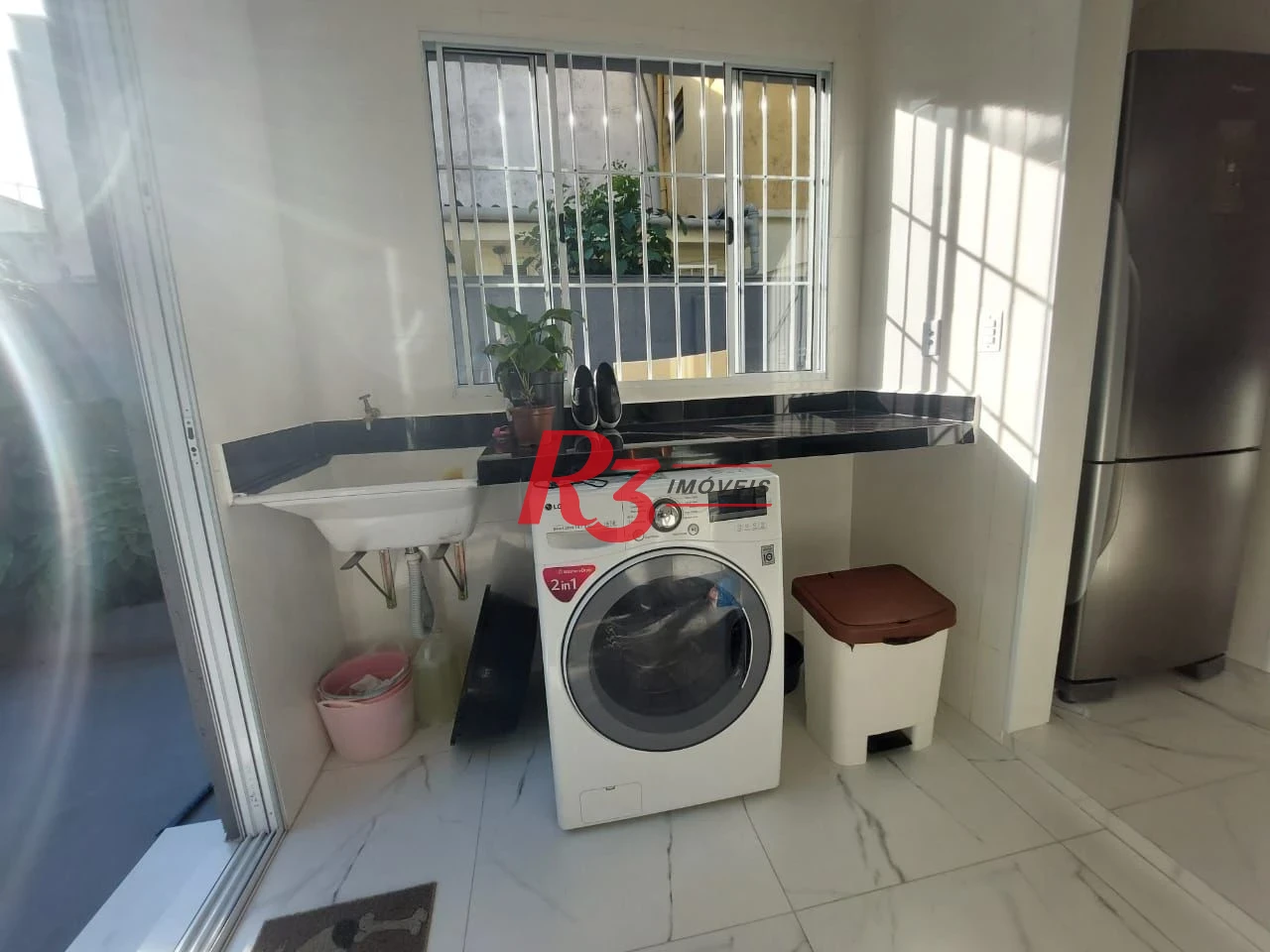 Sobrado com 3 dormitórios à venda, 200 m² por R$ 2.150.000,00 - Embaré - Santos/SP
