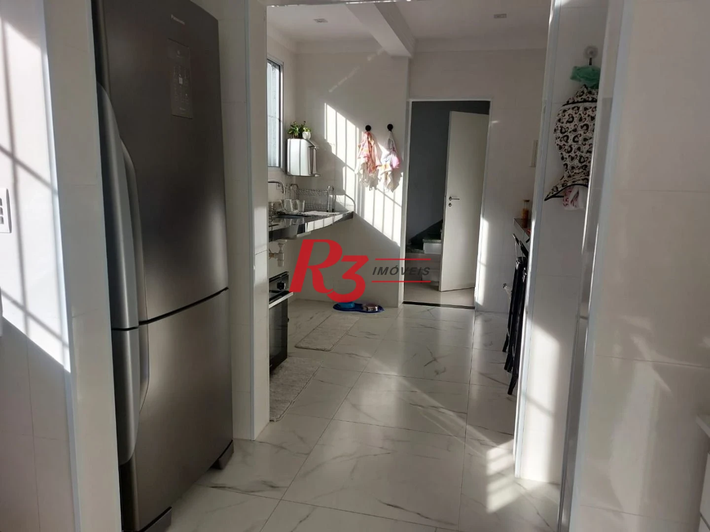 Sobrado com 3 dormitórios à venda, 200 m² por R$ 2.150.000,00 - Embaré - Santos/SP