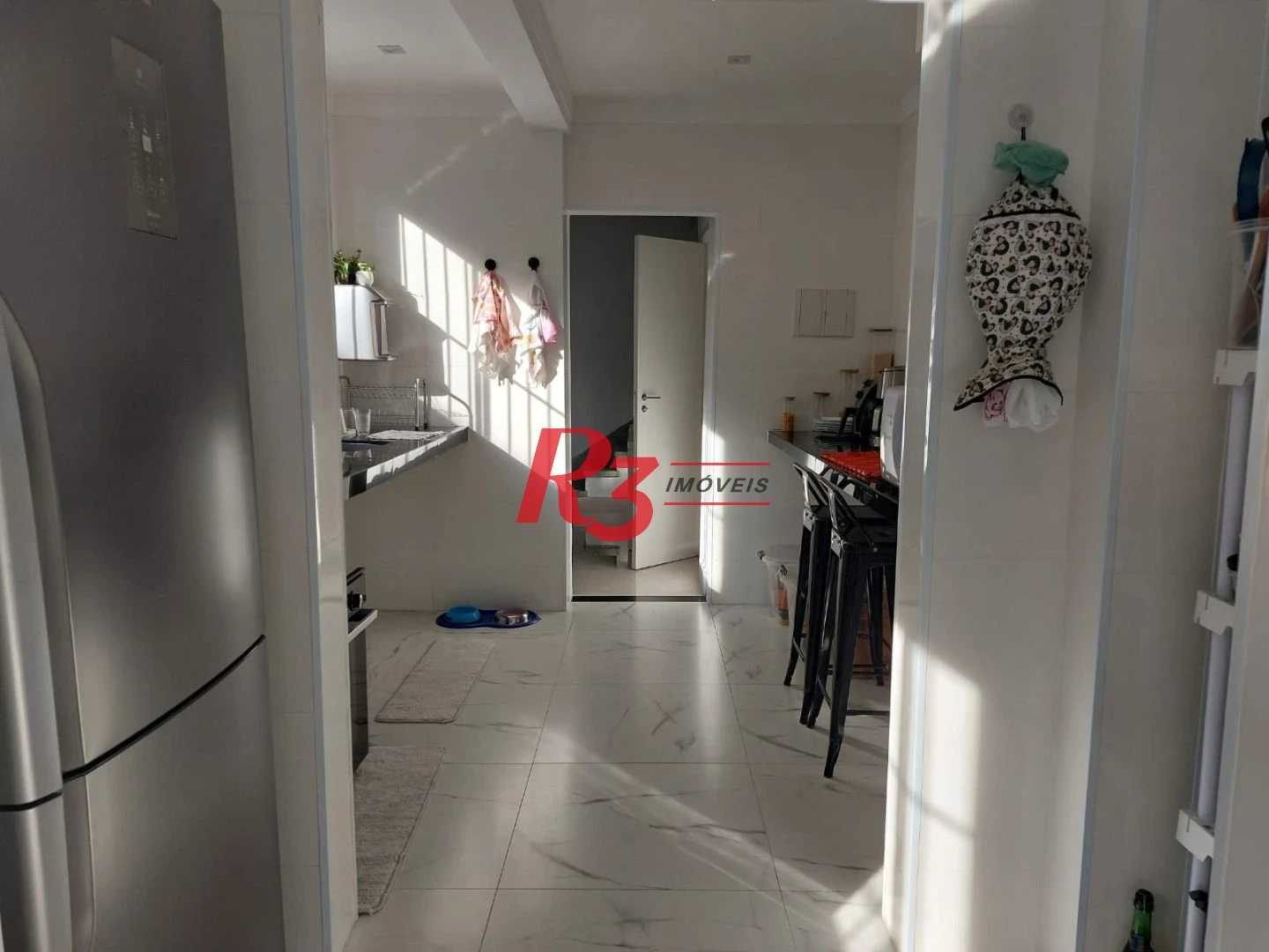 Sobrado com 3 dormitórios à venda, 200 m² por R$ 2.150.000,00 - Embaré - Santos/SP