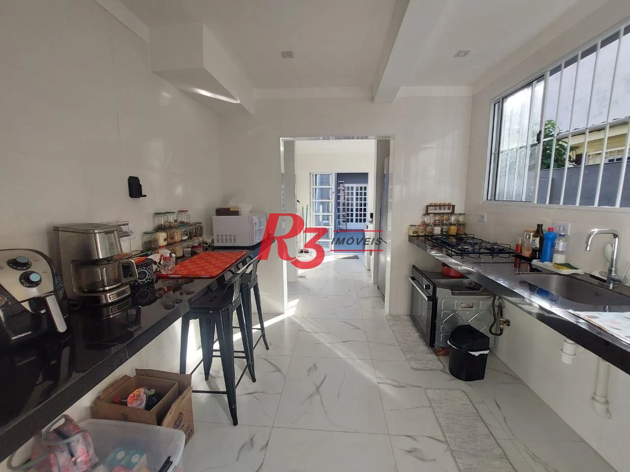 Sobrado com 3 dormitórios à venda, 200 m² por R$ 2.150.000,00 - Embaré - Santos/SP