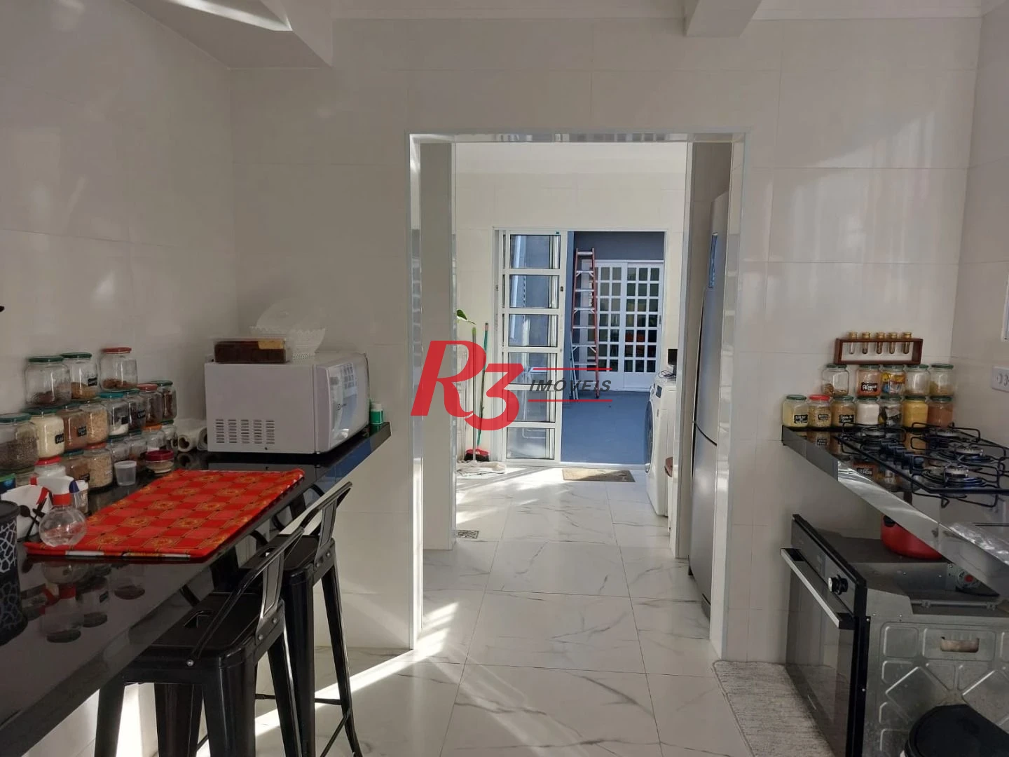 Sobrado com 3 dormitórios à venda, 200 m² por R$ 2.150.000,00 - Embaré - Santos/SP