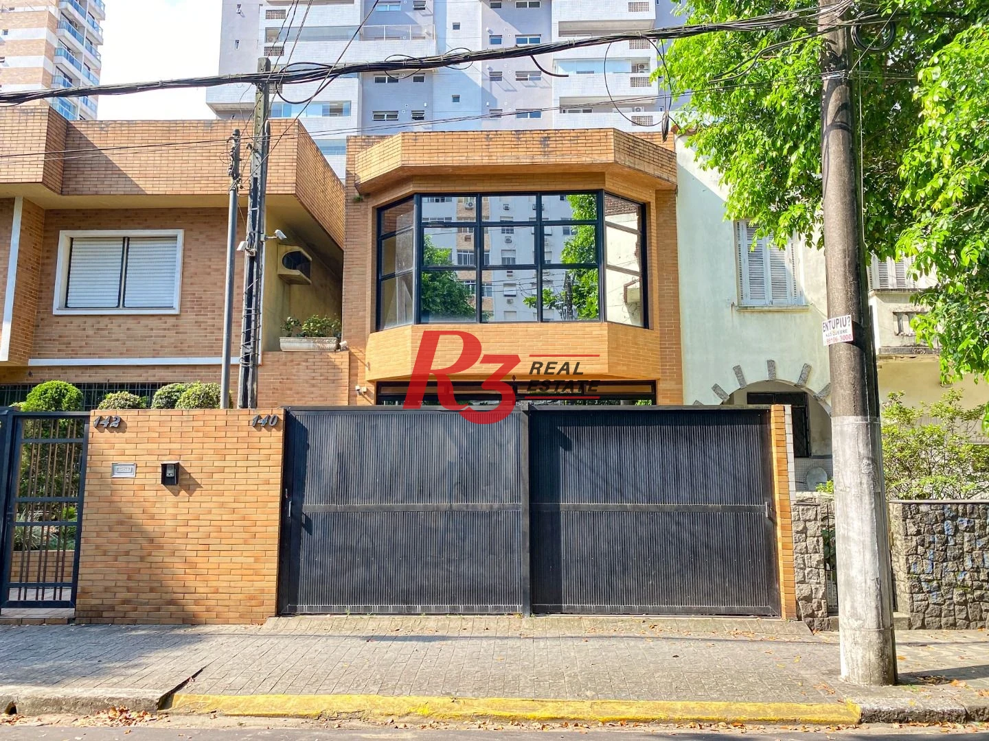 Sobrado com 3 dormitórios para alugar, 240 m² por R$ 23.659,11/mês - Gonzaga - Santos/SP