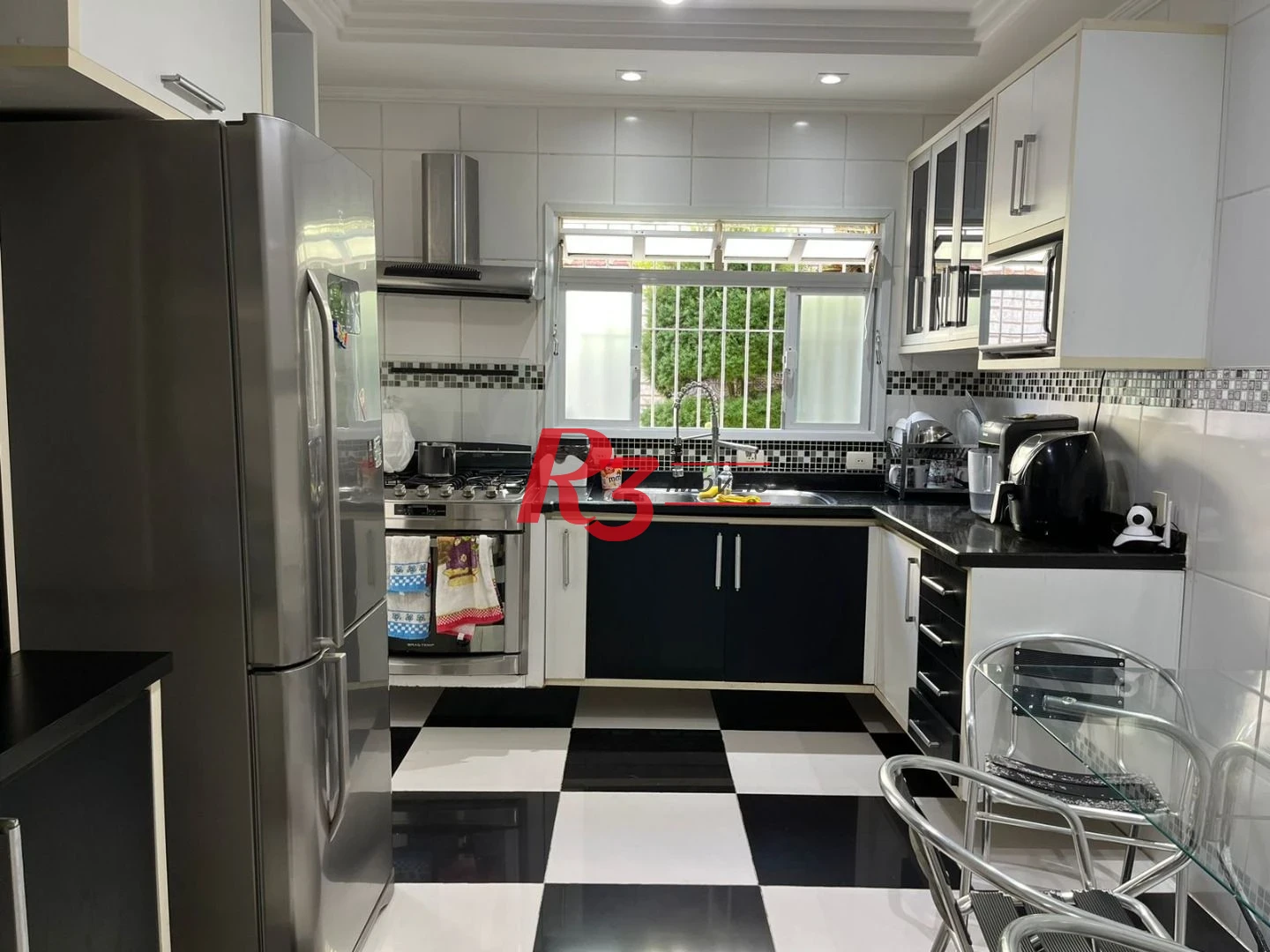 Casa à venda, 146 m² por R$ 1.100.000,00 - Macuco - Santos/SP